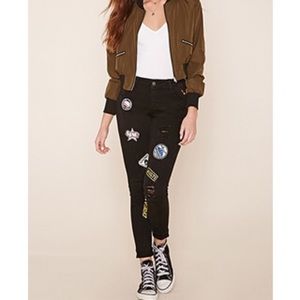 Black patch distressed jeans