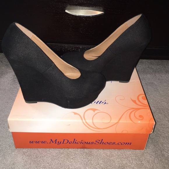 Black suede wedge heels