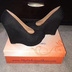 Black suede wedge heels