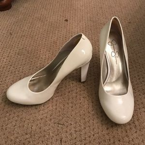 White patent leather pumps