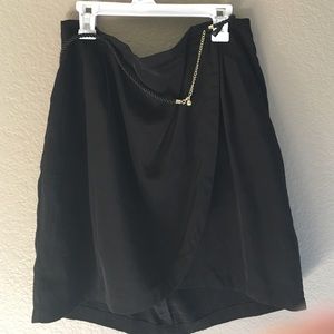 Knee length black skirt