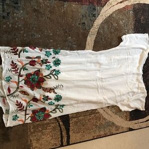 White flow dress with embroidery.