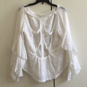 light & flowy top, caped arms & open back detail