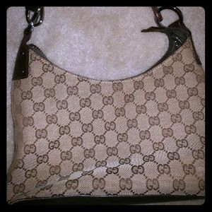 Gucci Brown Monogrammed medium size bag