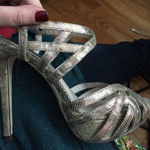 Steve Madden metallic silver pumps.