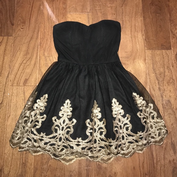 Black and gold strapless homecoming dress