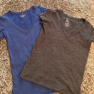 Two solid V necks