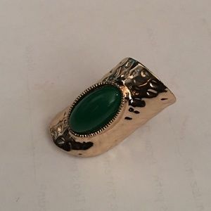 Gold and green studded ring