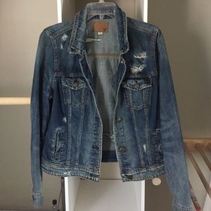 Distressed denim jacket