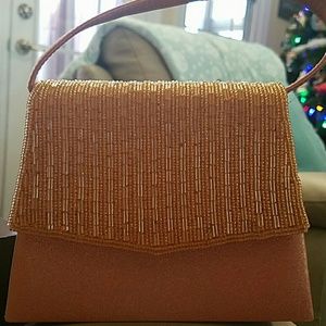 Cute small gold satin evening bag