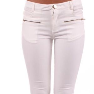 WHITE FAUX LEATHER PANTS WITH GOLD ZIPPER DETAIL