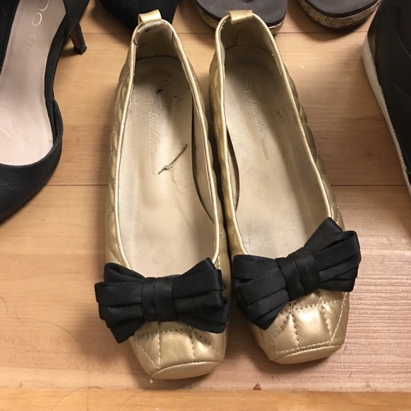 Gold Shoes with black ribbon