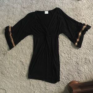 Swing tunic with bell sleeves