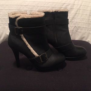 Black Faux leather and fur ankle boots.