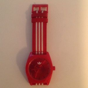 Red and White Adidas Watch.