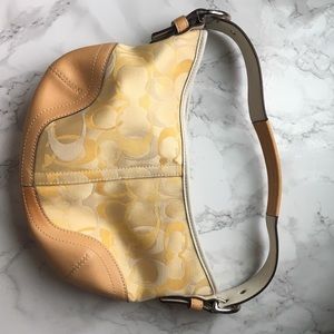 Small yellow and tan Coach Handbag