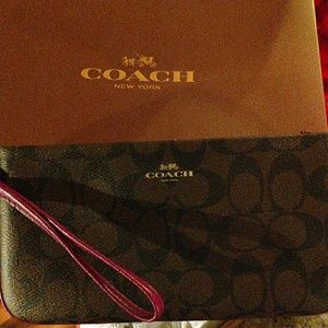 Brand new Coach leather wristlet