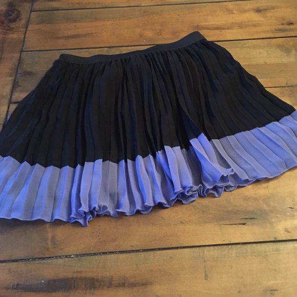 Black and lavender pleated miniskirt