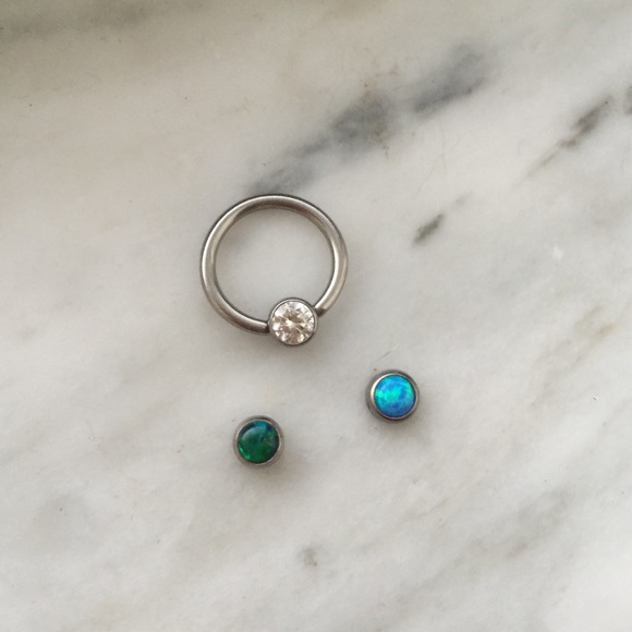 Captive bead ring for septum