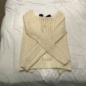 Delia's ivory split back sweater with navy ribbon