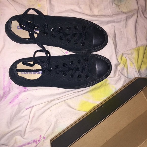 A pair of all black converses. Rarely worn.