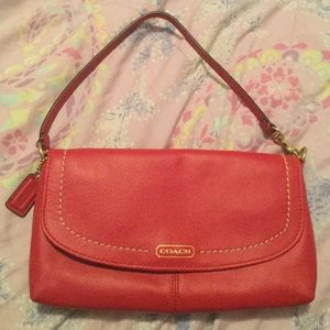Nice red coach clutch 👛.