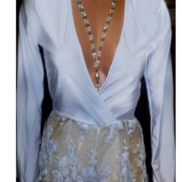Deep plunge white romper