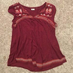 Red stitched design tee