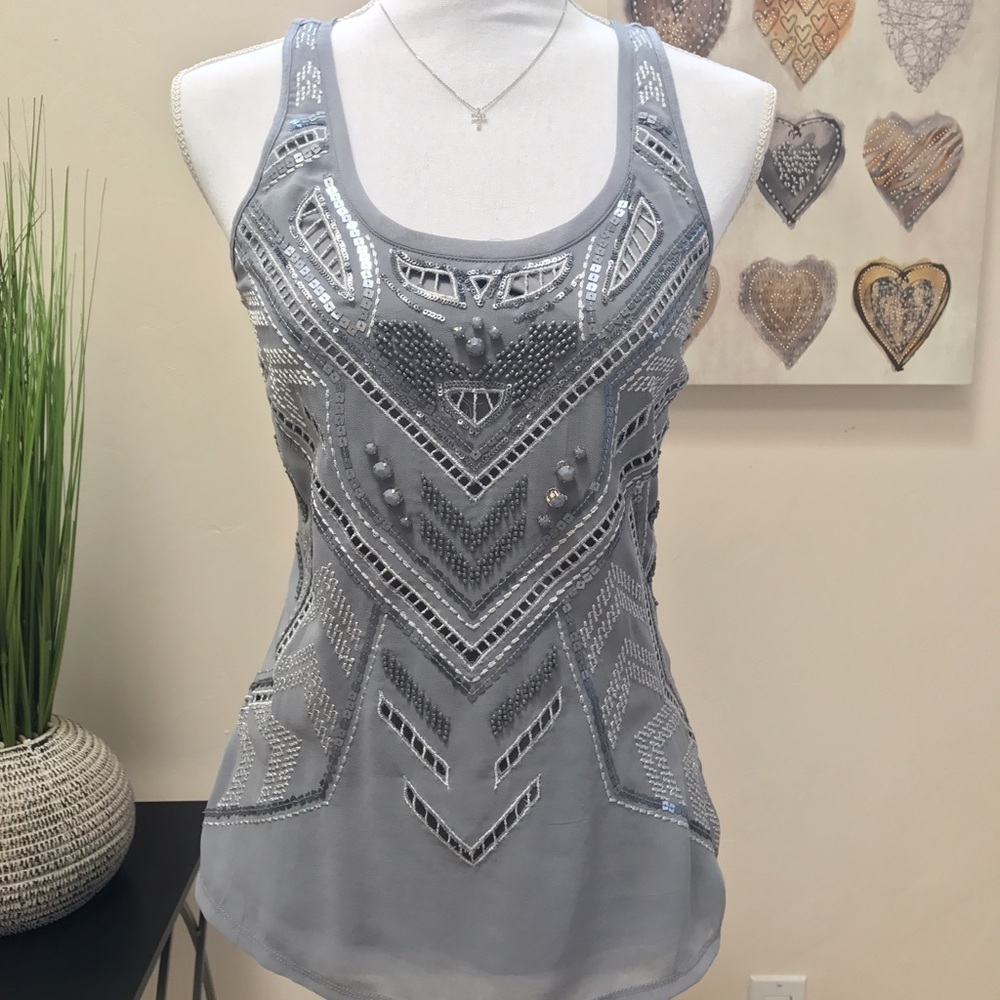 Embellished tank
