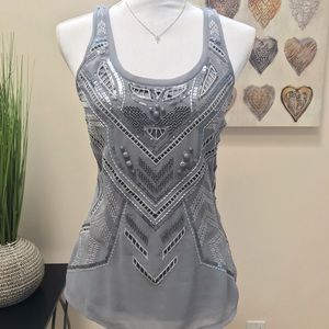 Embellished tank