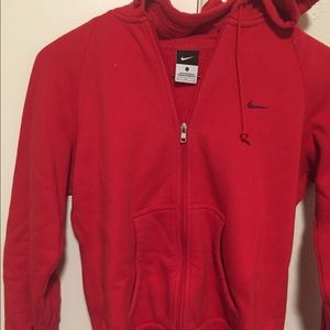 Nike red zip up hoodie.