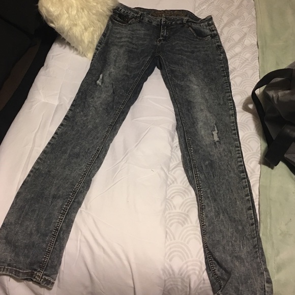 Jeans with leather patching