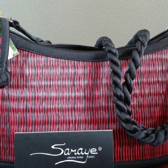 Woven handbag, made from Cambodian grasses.