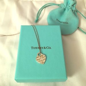 Tiffany Notes I Love You Pendant with bag and box.