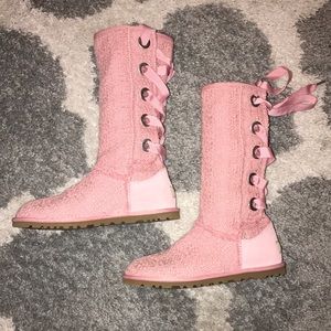 Pink Ugg lace up boots