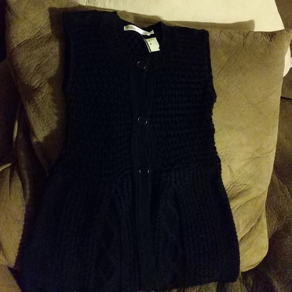 Beautiful crocheted kids long sleeveless jacket