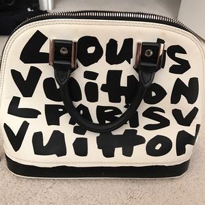 Black and white bowler bag.