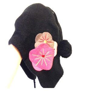 Parisian cloche hat with Pom poms and flowers