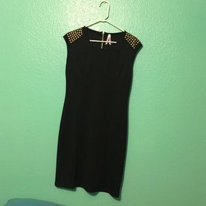 Black dress with gold stud shoulders