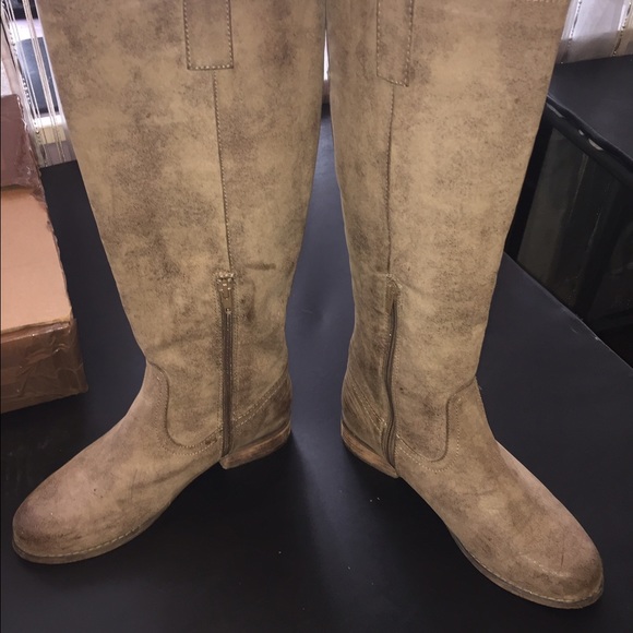 Distressed riding boot