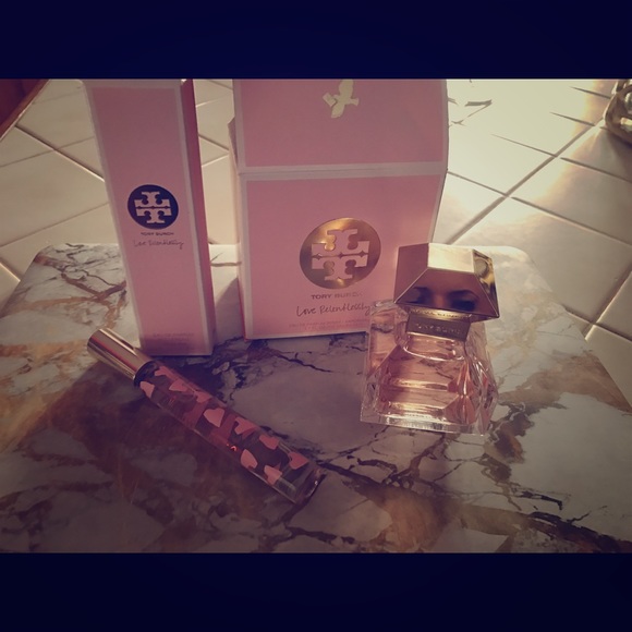 Tory Butch 1.7 oz perfume and 0.2 oz roller