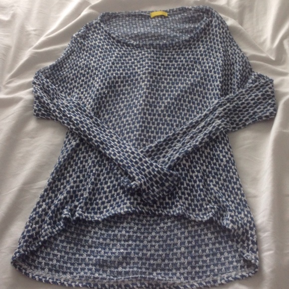 Blue and white knit top with open back