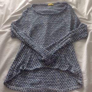 Blue and white knit top with open back