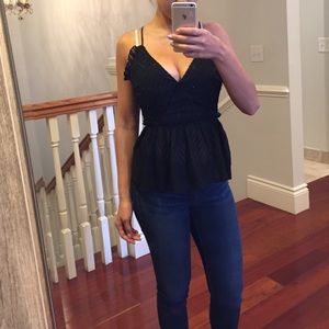 Black peplum ruffle tank