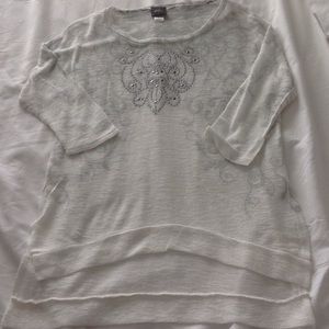 White top with grey design and jeweled detail