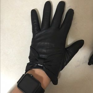 Black leather gloves