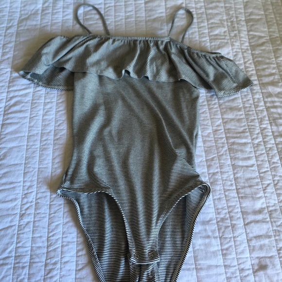 Black and white striped body suit