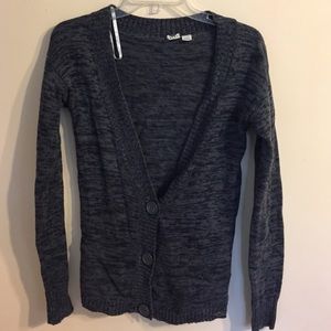 Gray cardigan.
