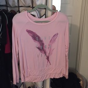 Long sleeve shirt reading, "live your life."