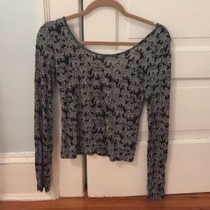 Long sleeved elephant patterned shirt